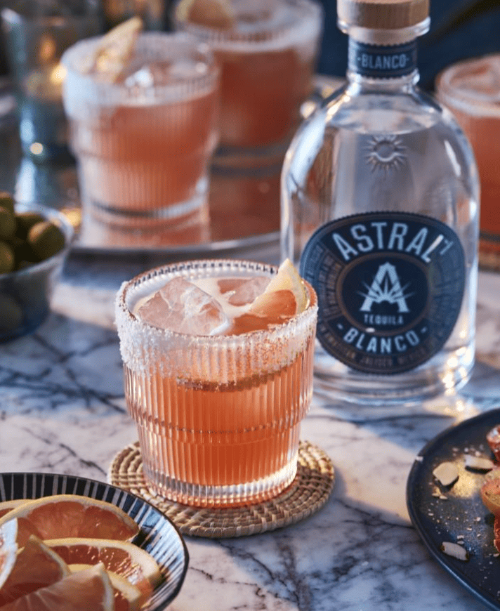 pink cocktail in rocks glass