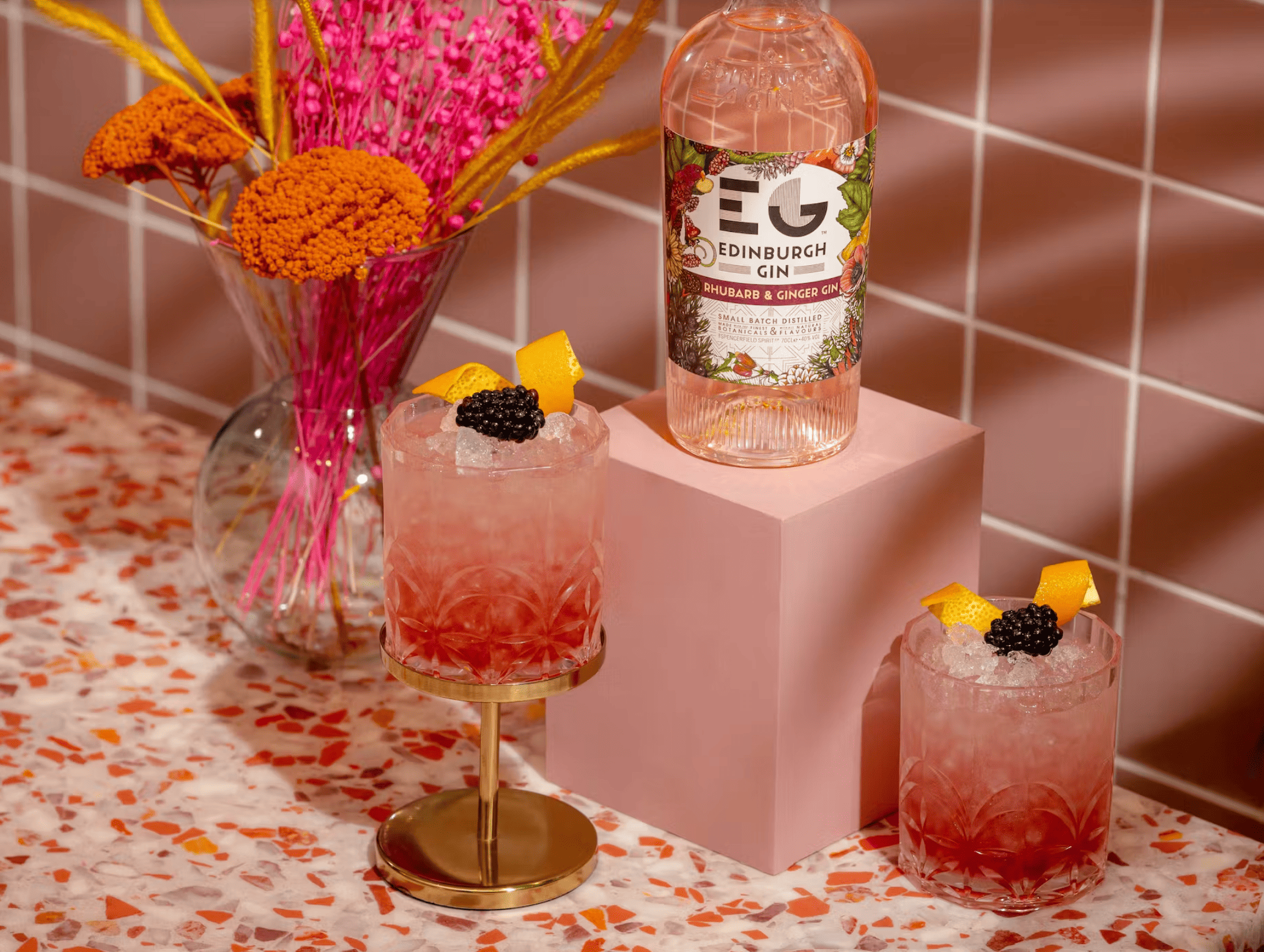 pink cocktails with rhubarb gin bottle