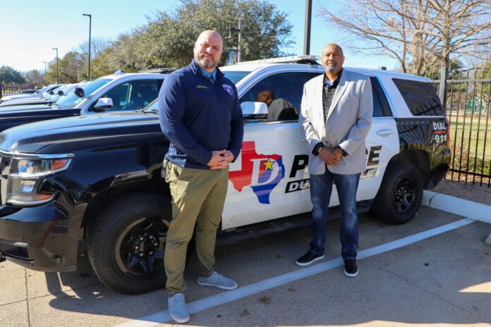 Matthew Stogner with Robert Brown in front of Duncanville PD SUV
