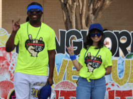 two students wearing neone yellow shirts