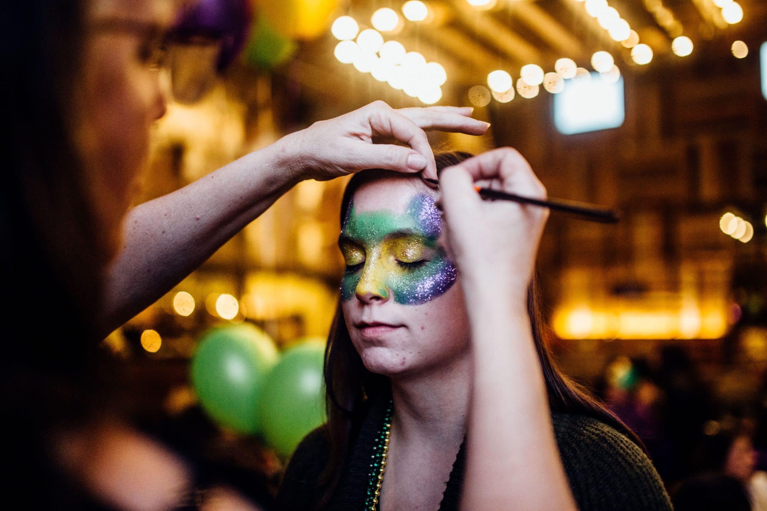 Mardi Gras face painters at The Rustic