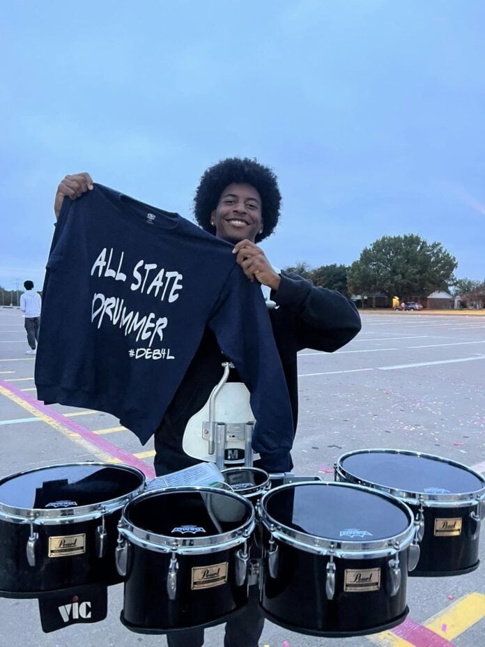 young man with drums