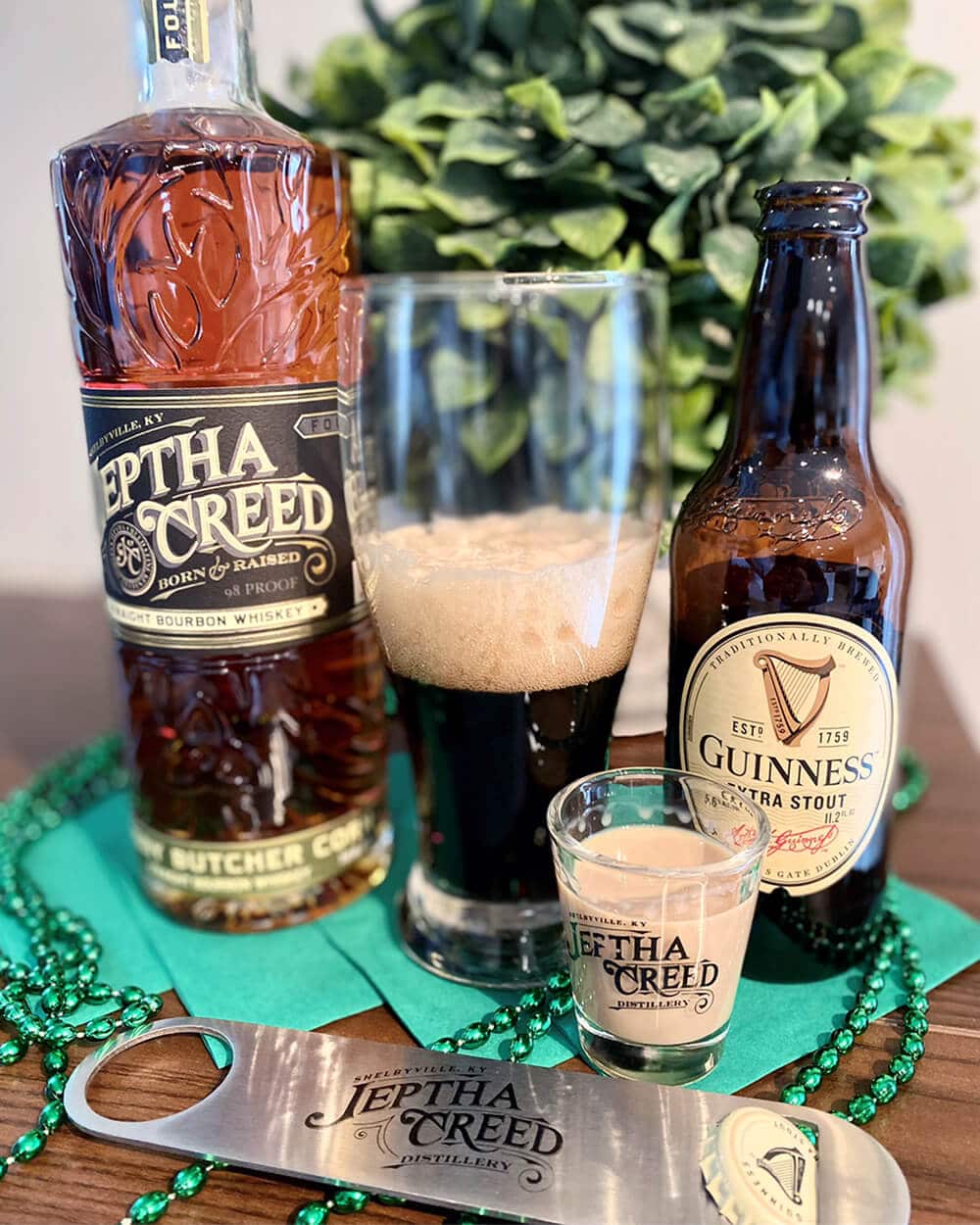 Jeptha Creed bourbon bottle and Guiness bottle