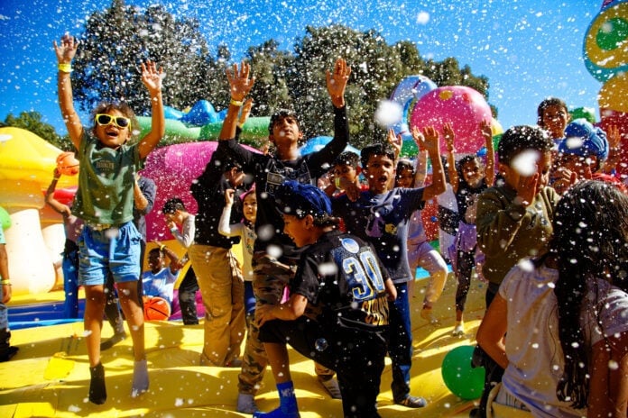 kids playing in bubbles