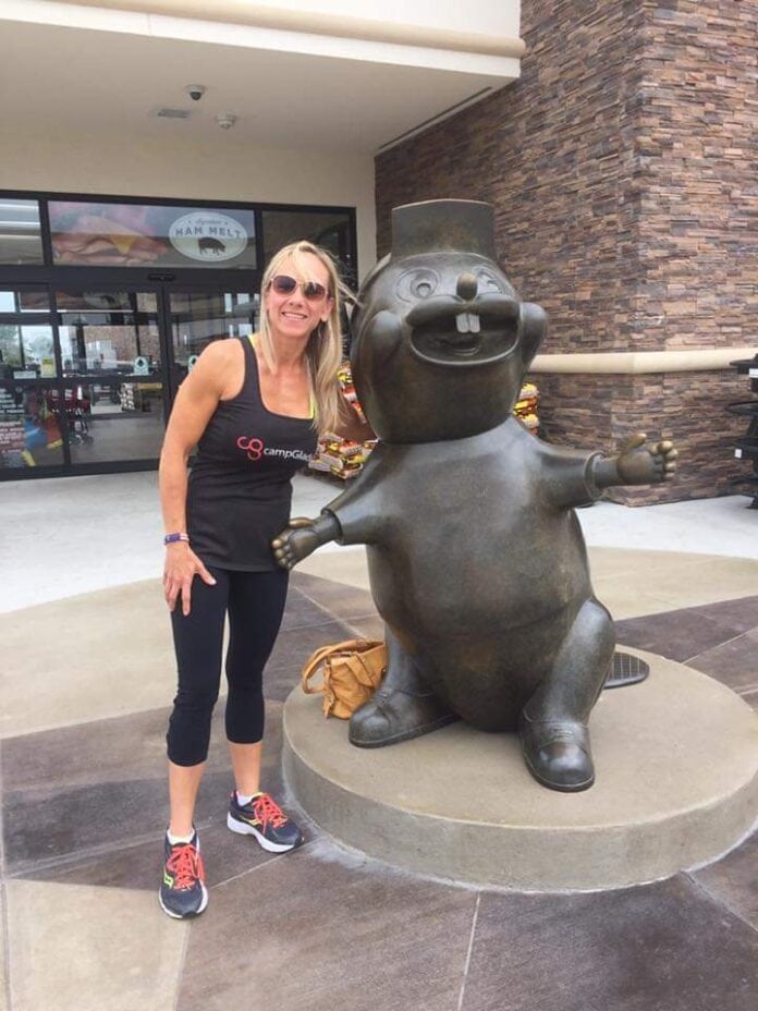 lady with beaver statue