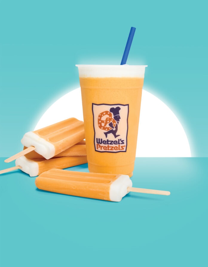 orange dream beverage with popsicle