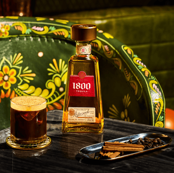 1800 tequila bottle and cocktail