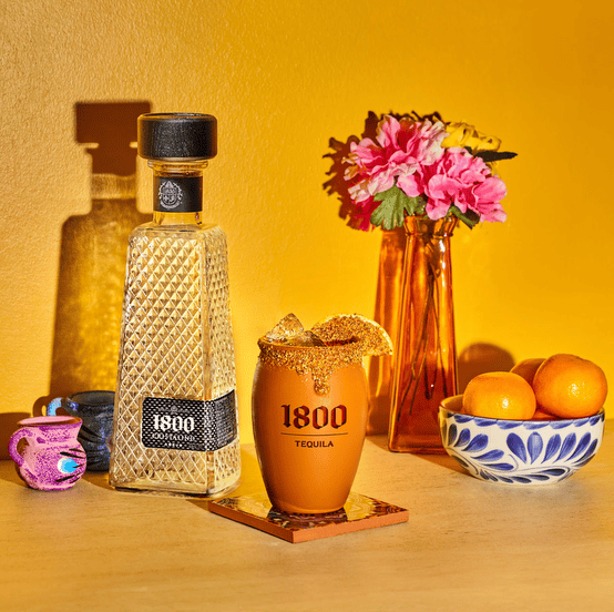 1800 tequila bottles and mug