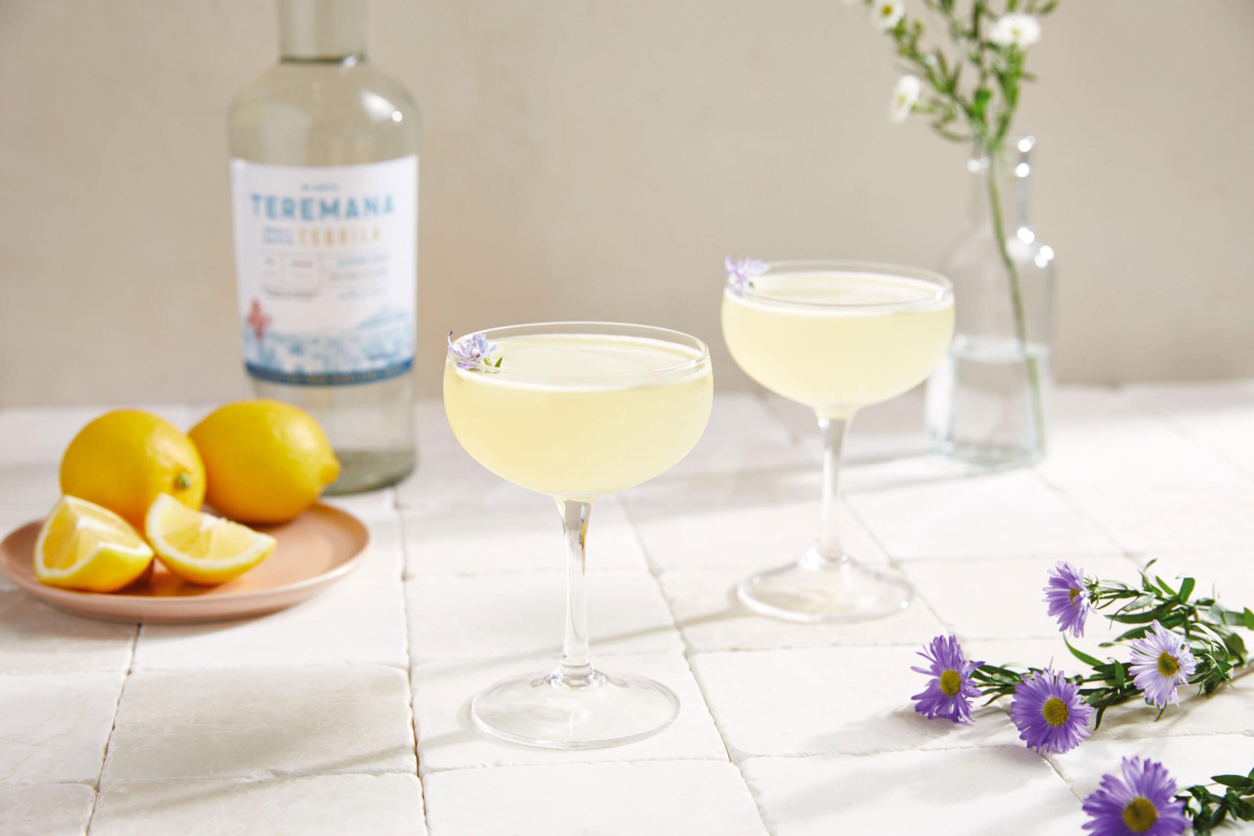 light yellow cocktails in coupe glasses