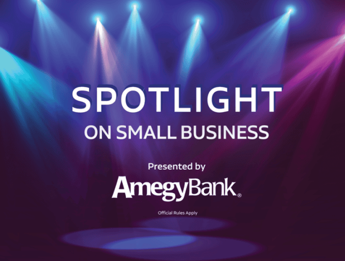 spotlights on dark blue background with text