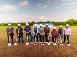 people with shovels and hard hats