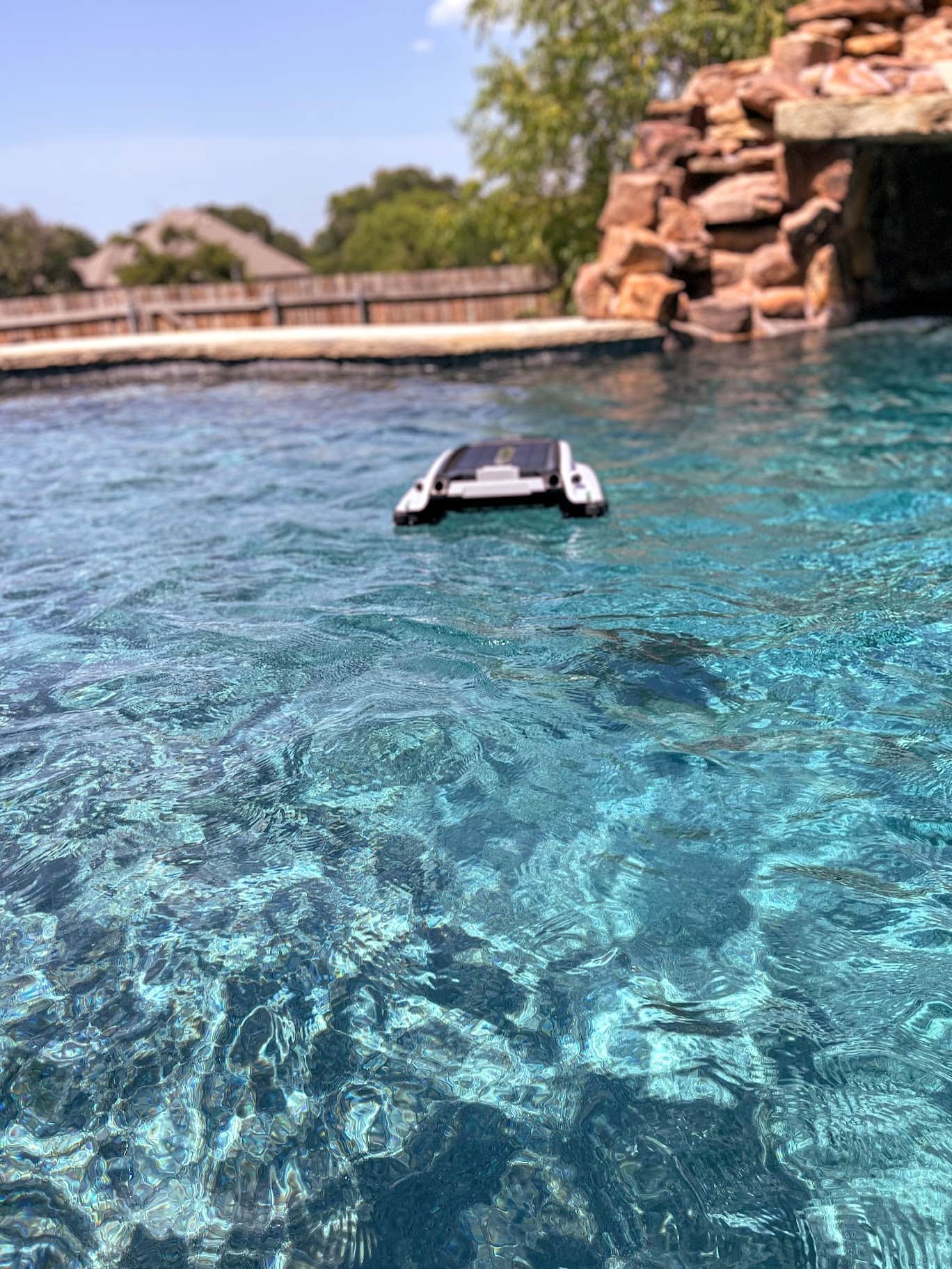 Pool skimmer on surface
