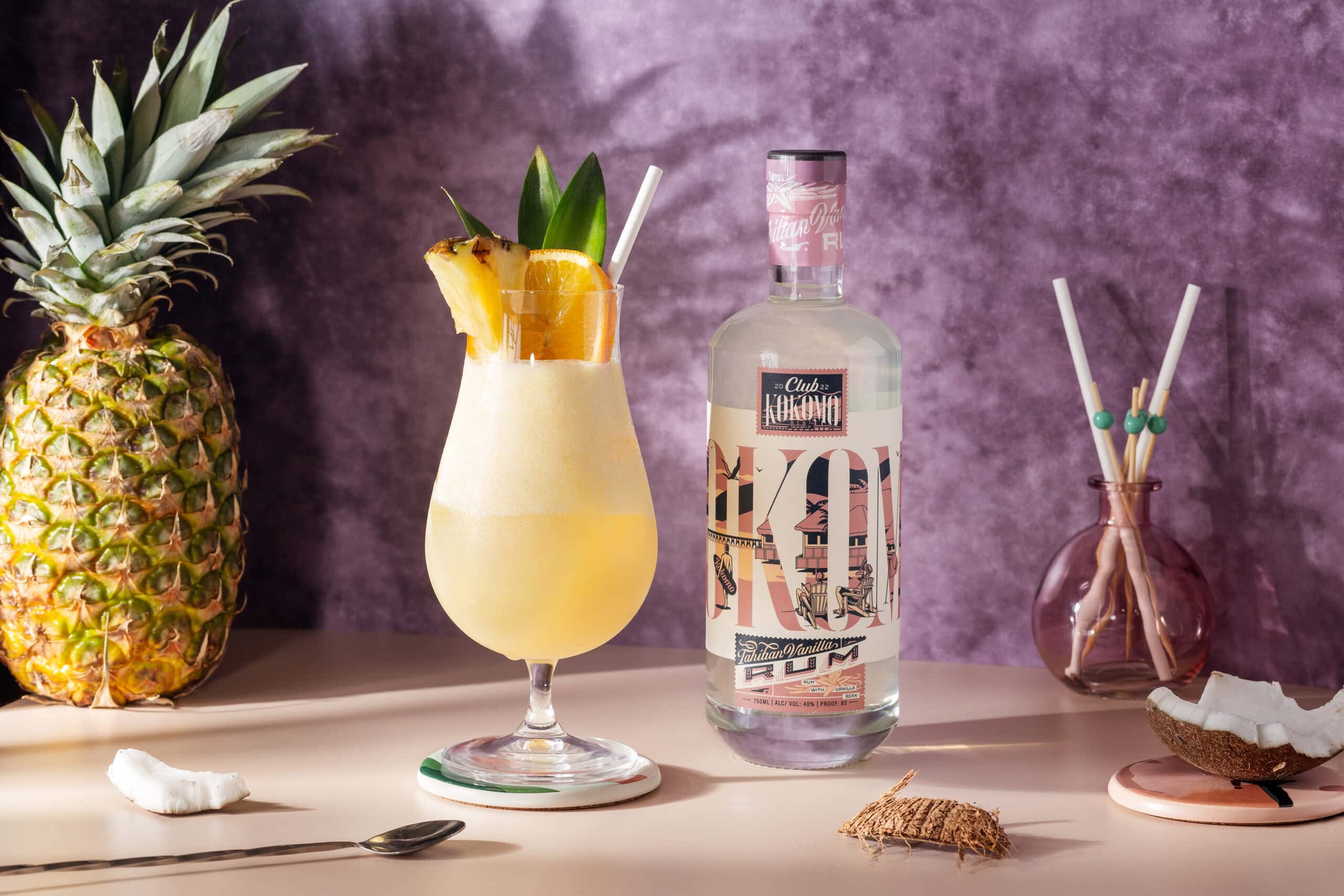 Pina colada with rum bottle