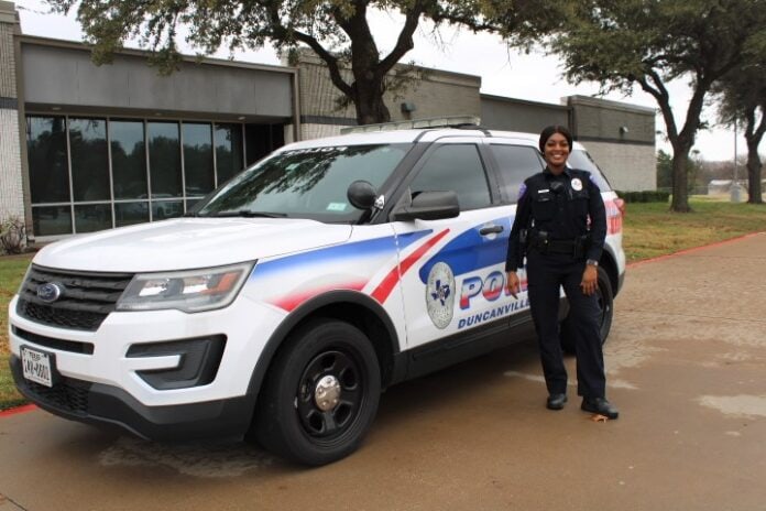 Duncanville ISD officer next to SUV