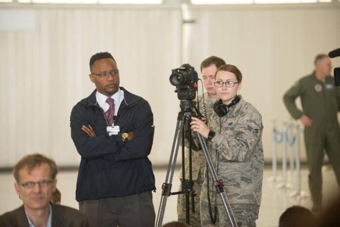 photos of people with camera equipment