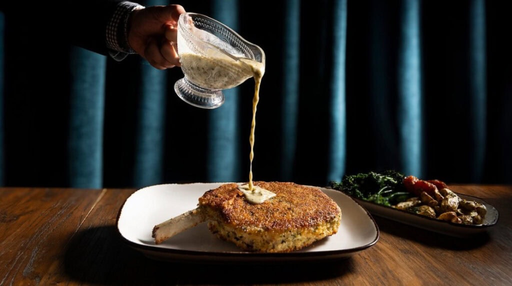 gravy boat with pork chop