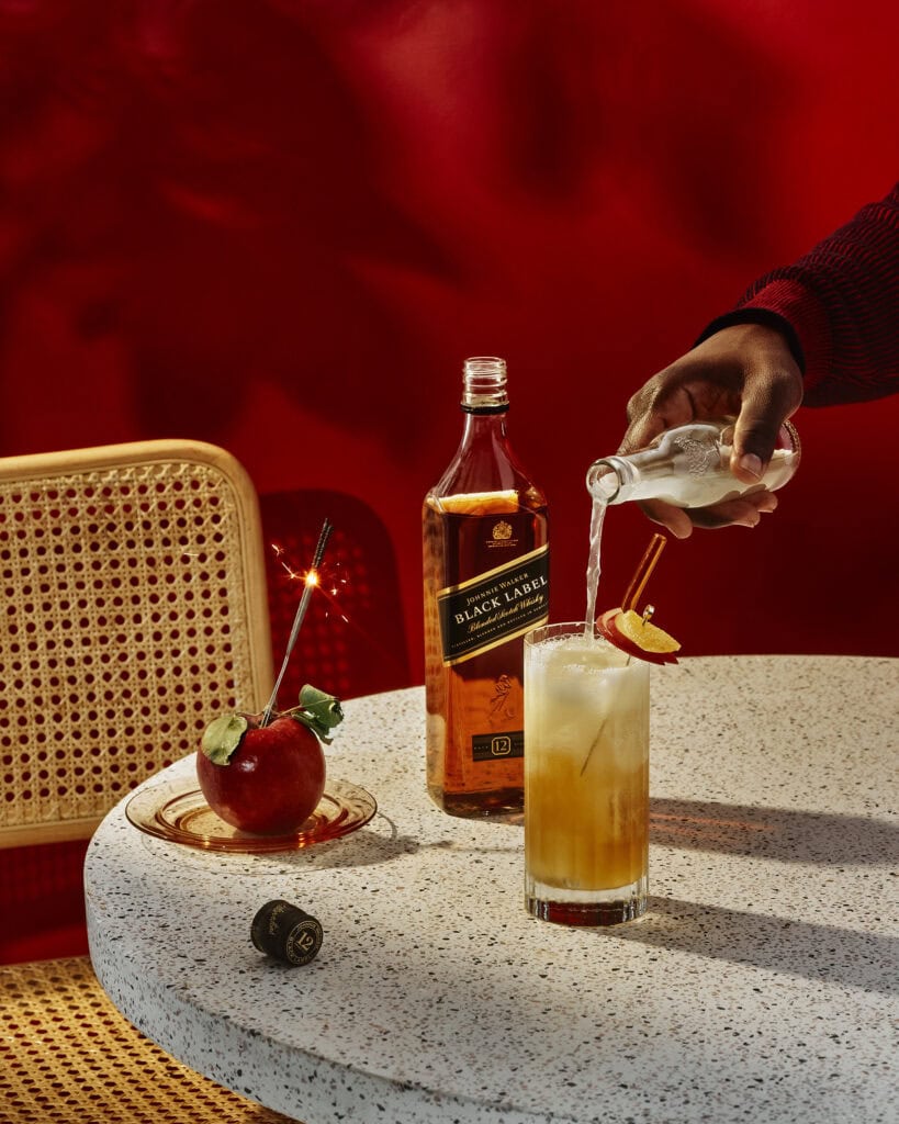 Johnnie walker black bottle with highball cocktail