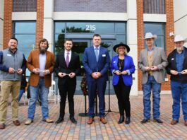 From left to right, Midlothian City Councilmen, Ross Weaver and Allen Moorman, Mayor Pro Tem Clark Wickliffe, Mayor Justin Coffman, Councilwoman Anna Hammonds, and Councilmembers Mike Rodgers and Wayne Shuffield