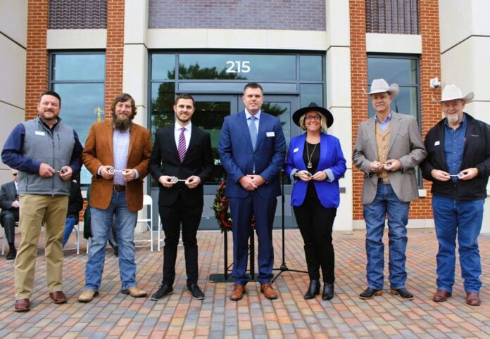 From left to right, Midlothian City Councilmen, Ross Weaver and Allen Moorman, Mayor Pro Tem Clark Wickliffe, Mayor Justin Coffman, Councilwoman Anna Hammonds, and Councilmembers Mike Rodgers and Wayne Shuffield