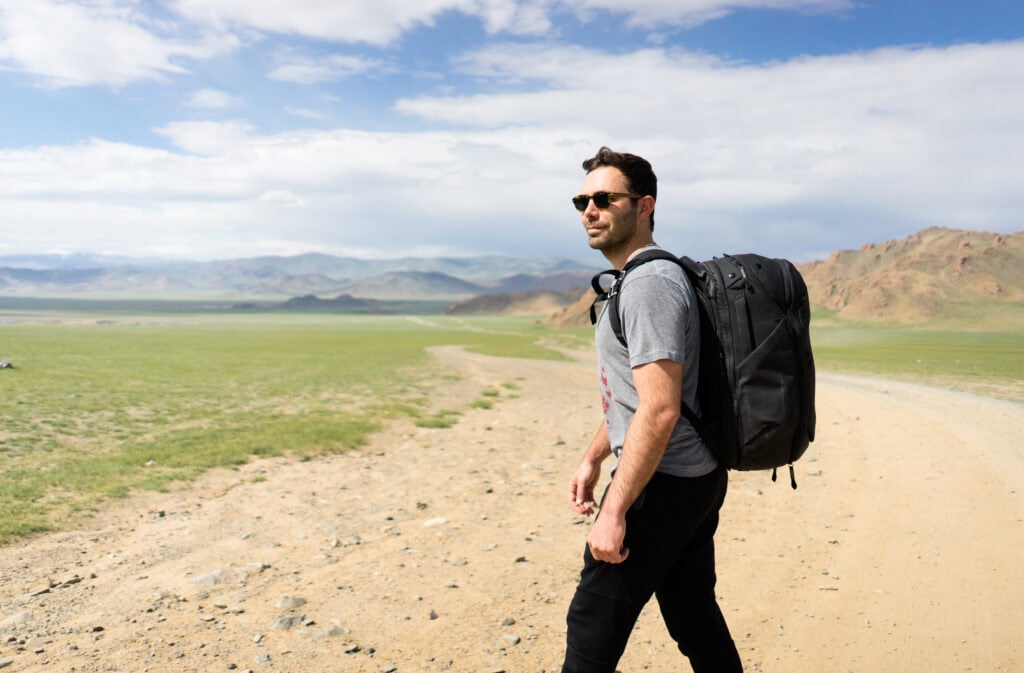 guy wearing black backpack