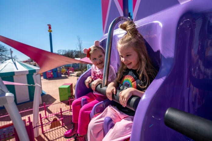 girl on amusement ride