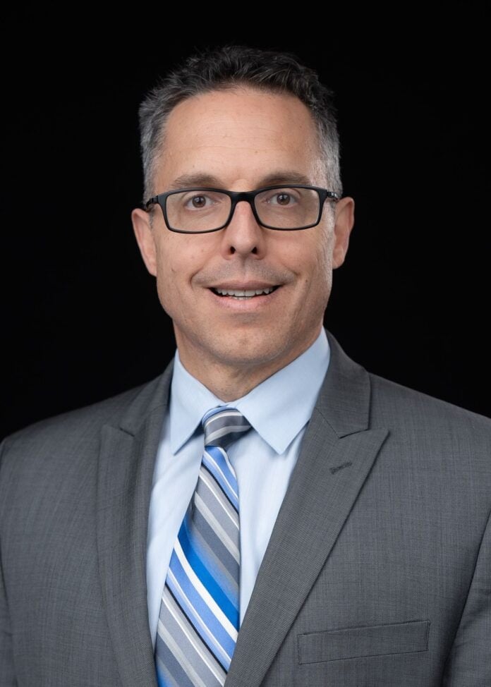 Mark J. Rauscher