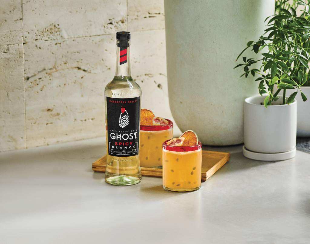 Passion fruit margarita with Ghost tequila bottle