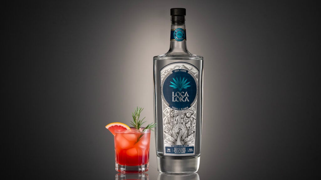red cocktail with Loca Loka tequila bottle