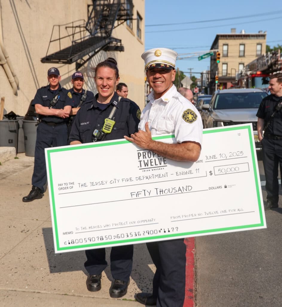 firemen with check