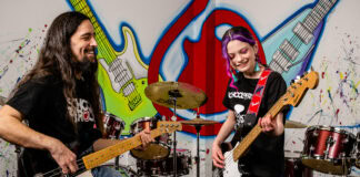 guy and girl with guitars