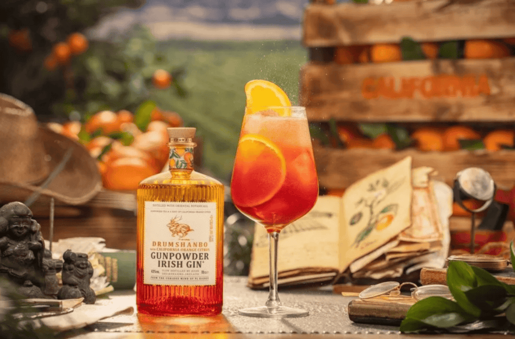 gin bottle and orange cocktail