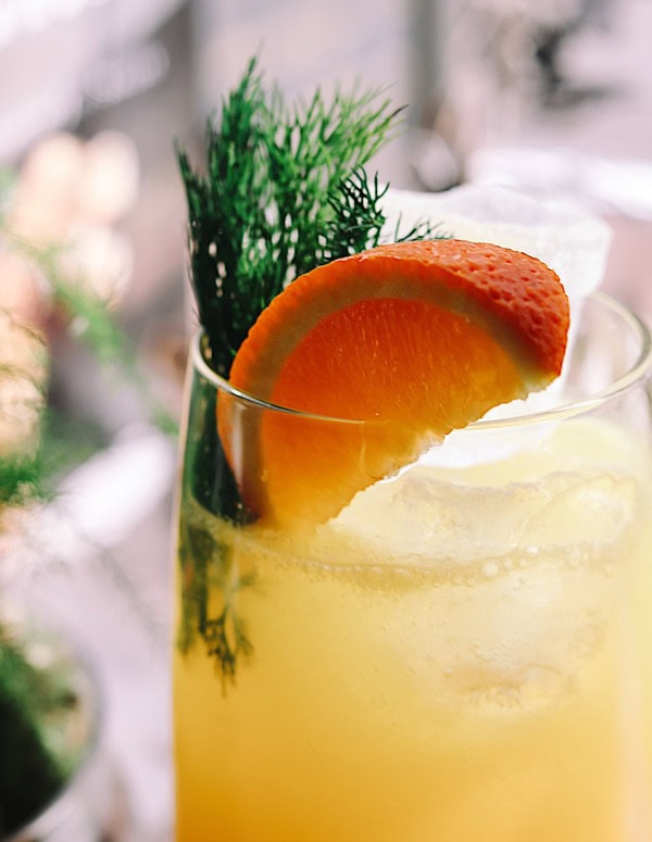 orange garnish on glass