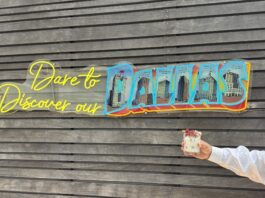 cocktail with Dallas sign