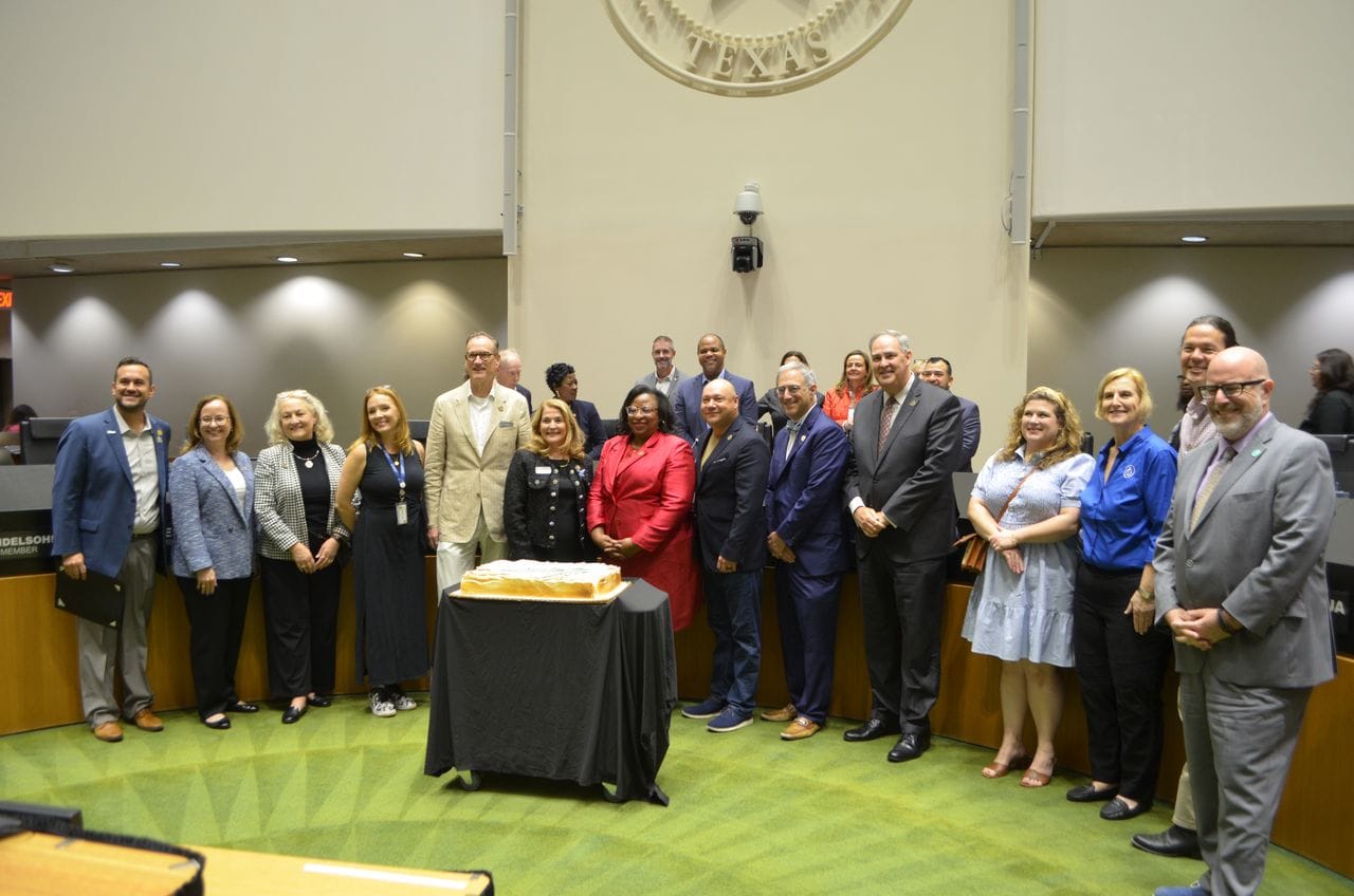 Dallas proclamation with Music Hall staff