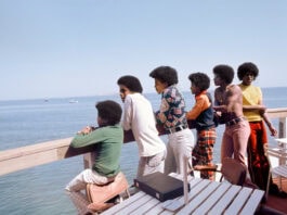 The Jackson Five on boat from Black Photojournalism exhibition